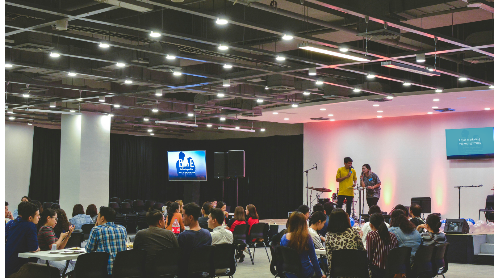 People seated at a networking event